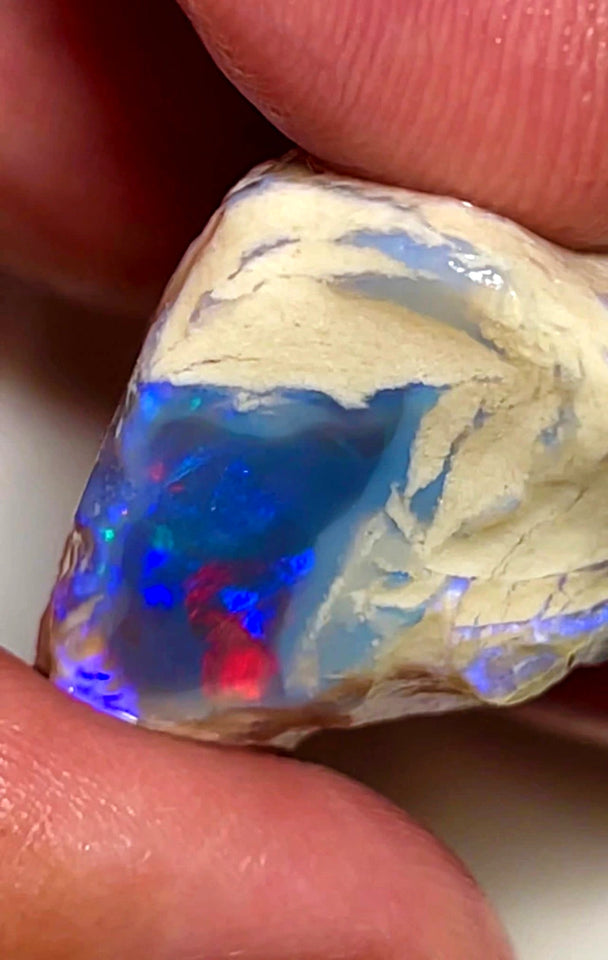 Lightning Ridge Rough Opal Dark Base Crystal Big Knobby 70cts Blues Red Green Multifires in stunning bar  35x25x15mm WAB92