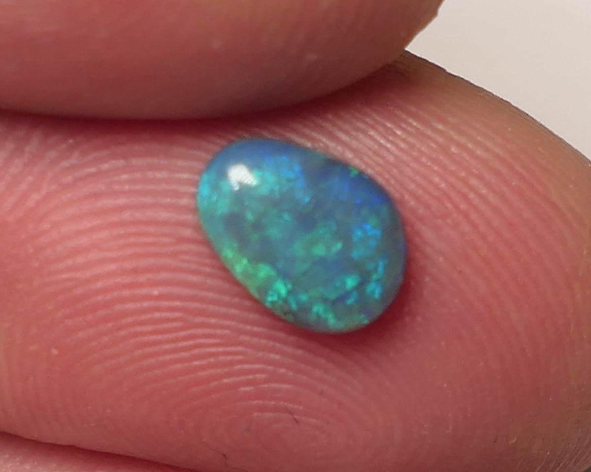 Lightning Ridge Dark Opal Gemstone 0.55cts Gem Grade  N5 Body Tone B3 Brightness Stunning Green/Blue fires 7x5x2mm WAC61