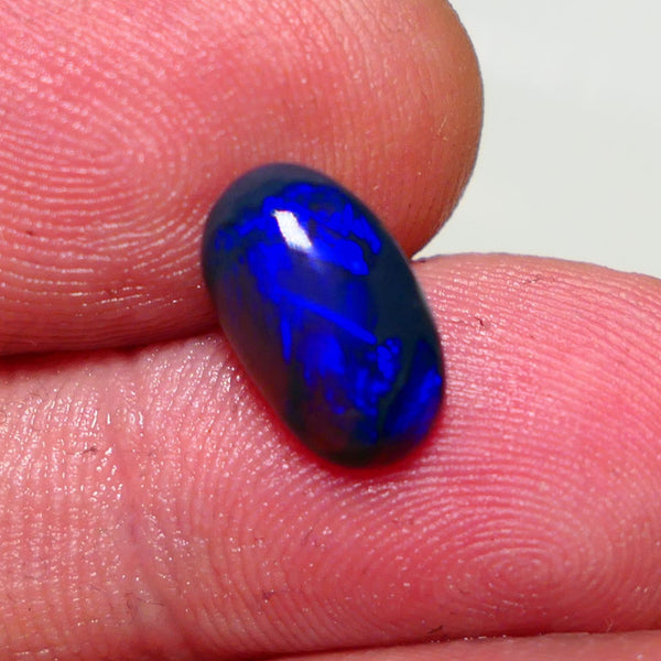 Lightning Ridge Semi Black Crystal Opal High Dome Gemstone 2.00cts GEM Grade N5 Body Tone B3 Brightness  Rolling Flash Royal Blues in various patterns 12.2x7.3x3.8mm 1327