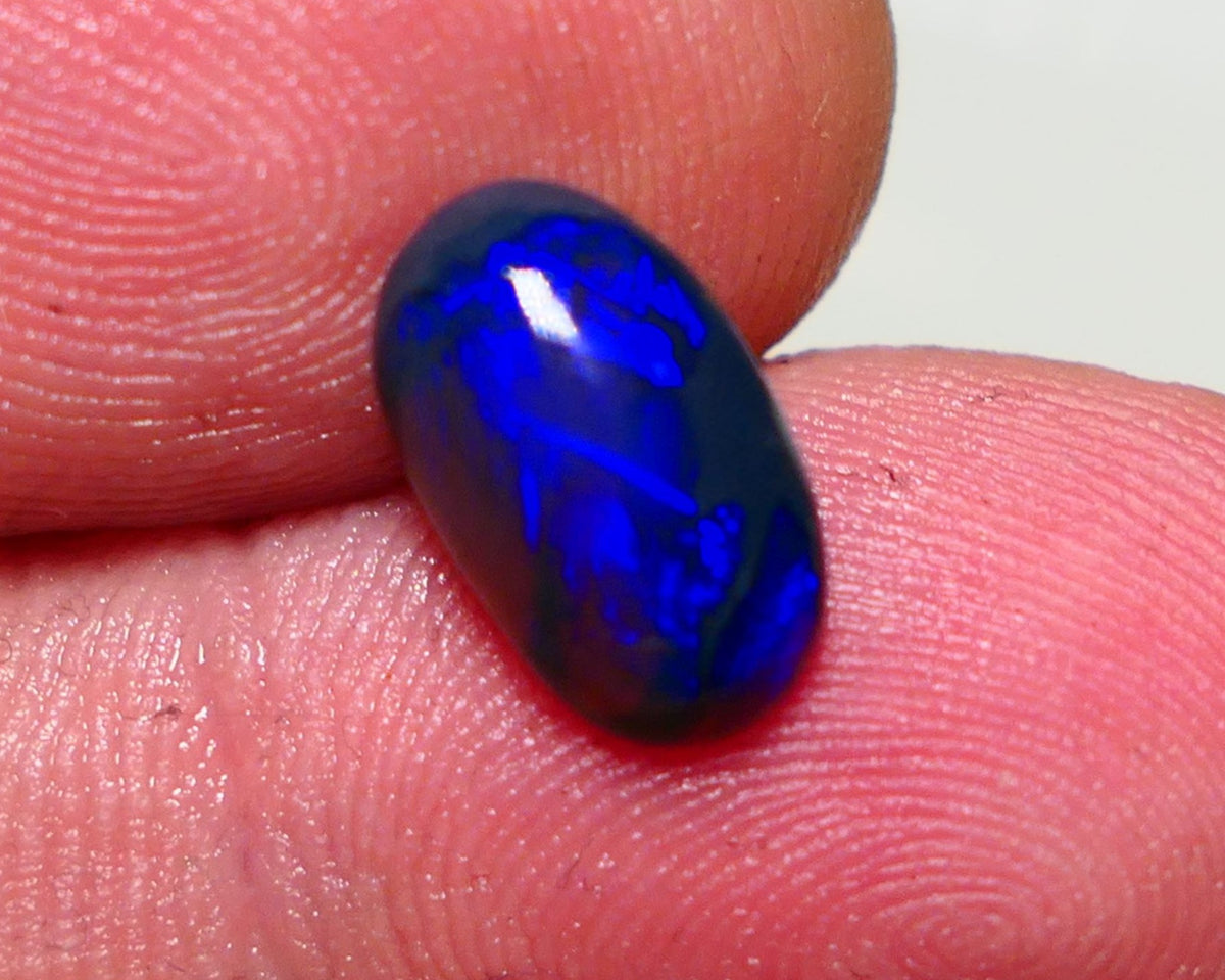 Lightning Ridge Semi Black Crystal Opal High Dome Gemstone 2.00cts GEM Grade N5 Body Tone B3 Brightness  Rolling Flash Royal Blues in various patterns 12.2x7.3x3.8mm 1327