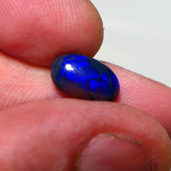 Lightning Ridge Semi Black Crystal Opal High Dome Gemstone 2.00cts GEM Grade N5 Body Tone B3 Brightness  Rolling Flash Royal Blues in various patterns 12.2x7.3x3.8mm 1327