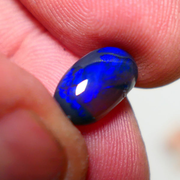 Lightning Ridge Semi Black Crystal Opal High Dome Gemstone 2.00cts GEM Grade N5 Body Tone B3 Brightness  Rolling Flash Royal Blues in various patterns 12.2x7.3x3.8mm 1327