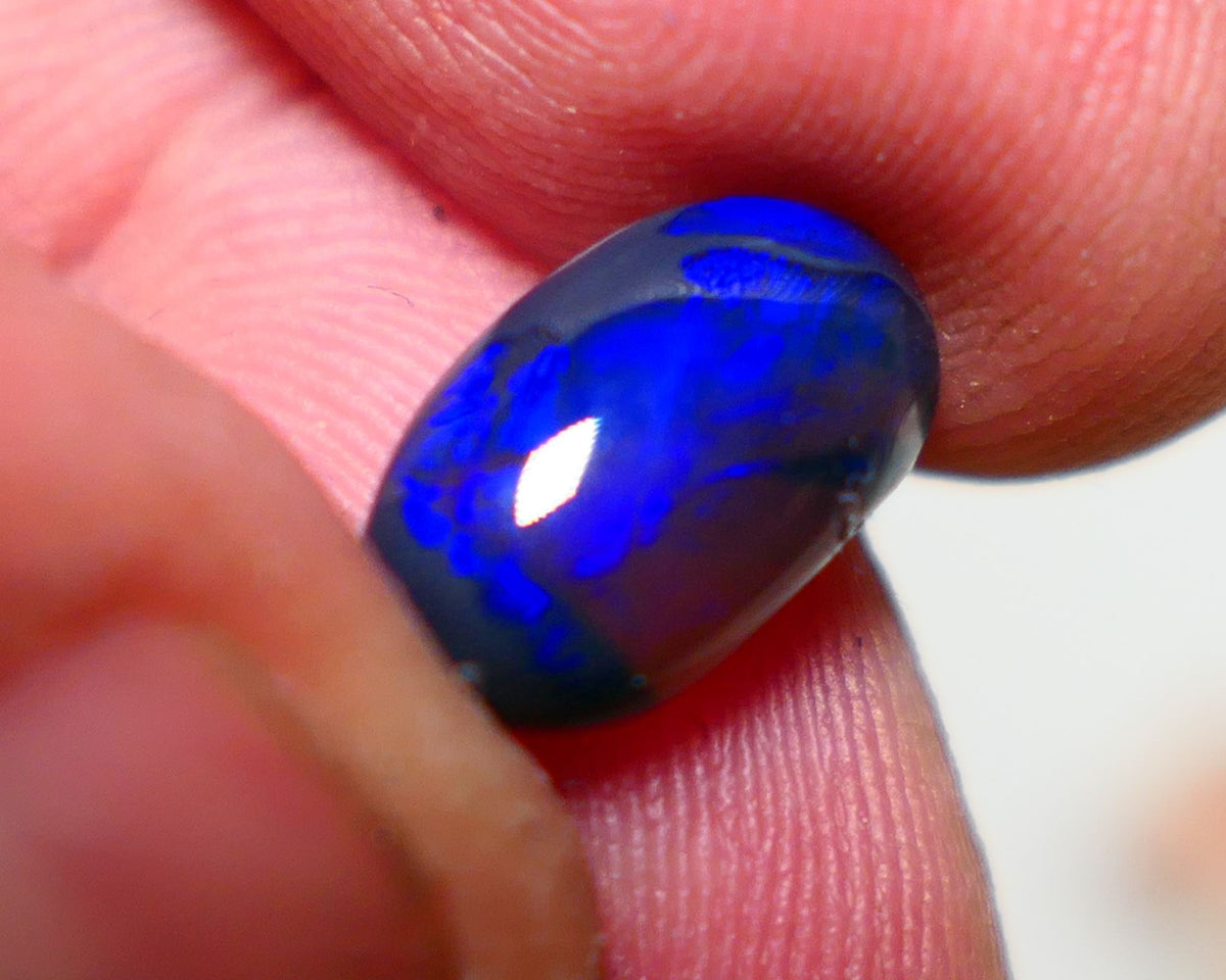 Lightning Ridge Semi Black Crystal Opal High Dome Gemstone 2.00cts GEM Grade N5 Body Tone B3 Brightness  Rolling Flash Royal Blues in various patterns 12.2x7.3x3.8mm 1327