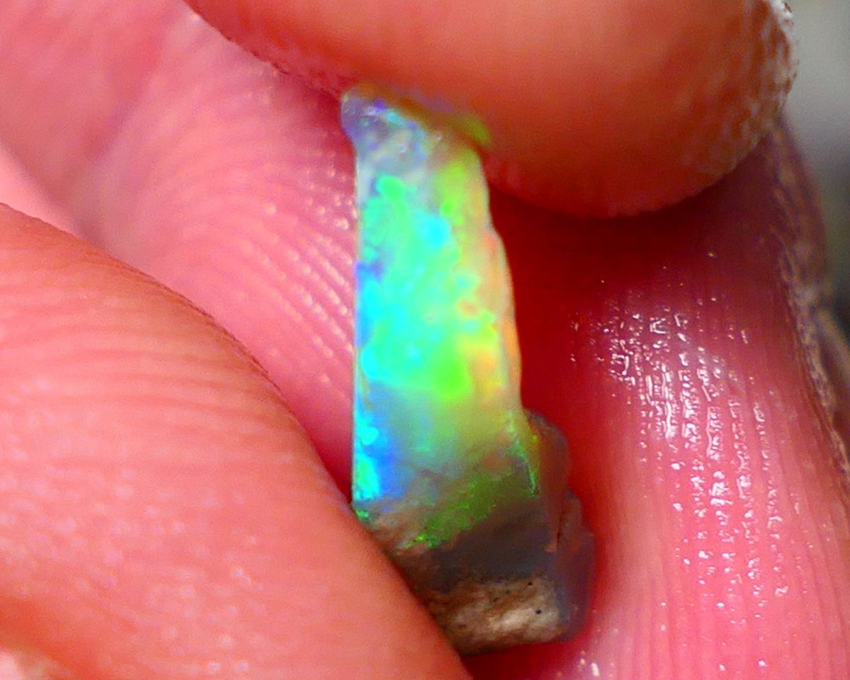 Small Candy to Cut Crystal on dark base 1.80cts Exotic bar with Vivid & Bright fires 14x5x4mm NS144