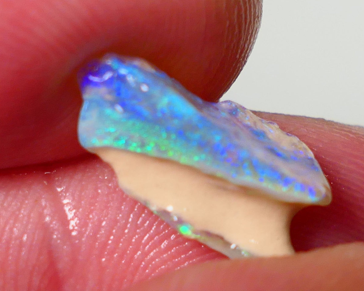 Small Candy to Cut Crystal on dark base seam formation 3.50cts Exotic bar with Bright fires 17x7x6mm NS176