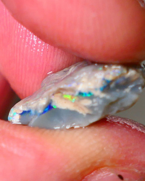 Lightning Ridge Seam opal rough 6.05cts showing Gemmy Very bright consistent flt bar with multi colours to cut worth a gamble on this one cut a gem 16x12x6mm ALP117