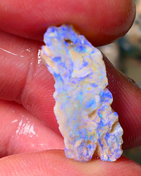 Lightning Ridge Gamble opal rough rub showing nice bright blue colours 26x10x7mm ALP128