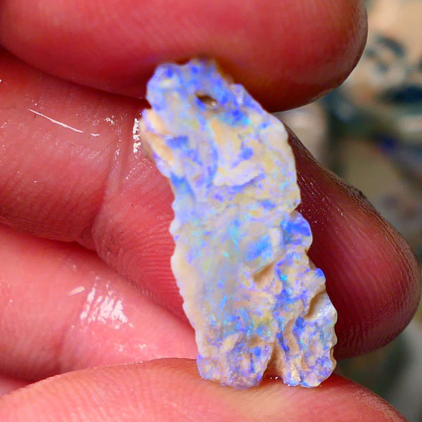 Lightning Ridge Gamble opal rough rub showing nice bright blue colours 26x10x7mm ALP128