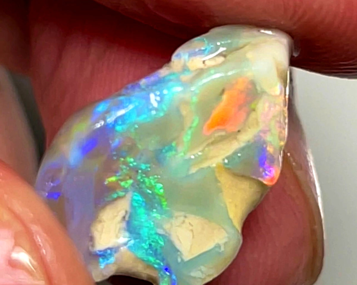 Lightning Ridge 9.5cts Bright knobby Crystal Opal rough lots of Multifires showing 17x11x11 mm 1129