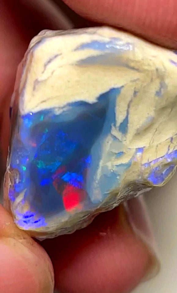 Lightning Ridge Rough Opal Dark Base Crystal Big Knobby 70cts Blues Red Green Multifires in stunning bar  35x25x15mm WAB92