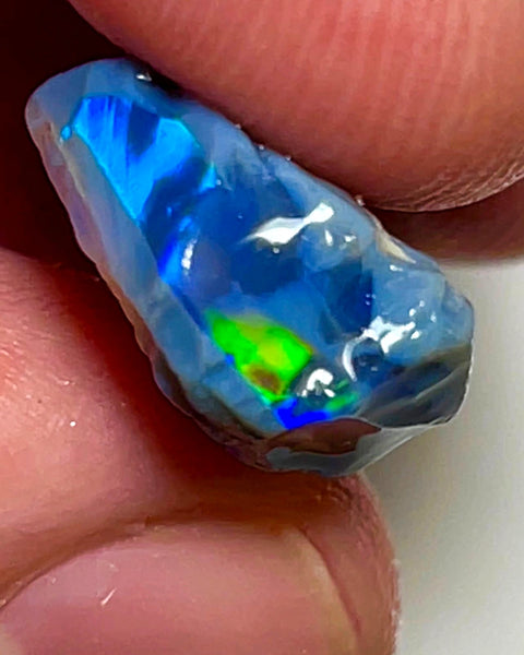 Lightning Ridge Rough Opal 12.4cts Stunning Black base Seams to cut Gorgeous Bright Multi fires in bar to cut 26x12x8mm WAD43