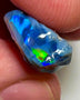 Lightning Ridge Rough Opal 12.4cts Stunning Black base Seams to cut Gorgeous Bright Multi fires in bar to cut 26x12x8mm WAD43