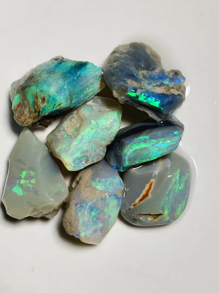 Lightning Ridge Opal Rubs n rough Parcel Dark bases from the Miners Bench® 31cts Stunning Bright Multifires to faces 15x8x6mm to 12x8x5mm WSY57