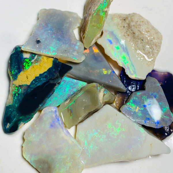 Australian Opal Rubs Parcel Black, Semi Black & Crystal Plate of colour from the Miners Bench® 44cts Bright FIRES / MULTIFIRES to faces 21x13x9mm to 9x9x3mm WSP90